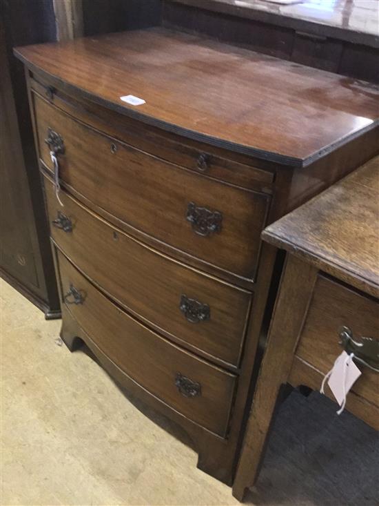 Georgian style small mahogany bow-fronted three-drawer chest, fitted slide